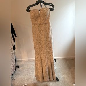 Beautiful strapless mermaid style wedding dress.
